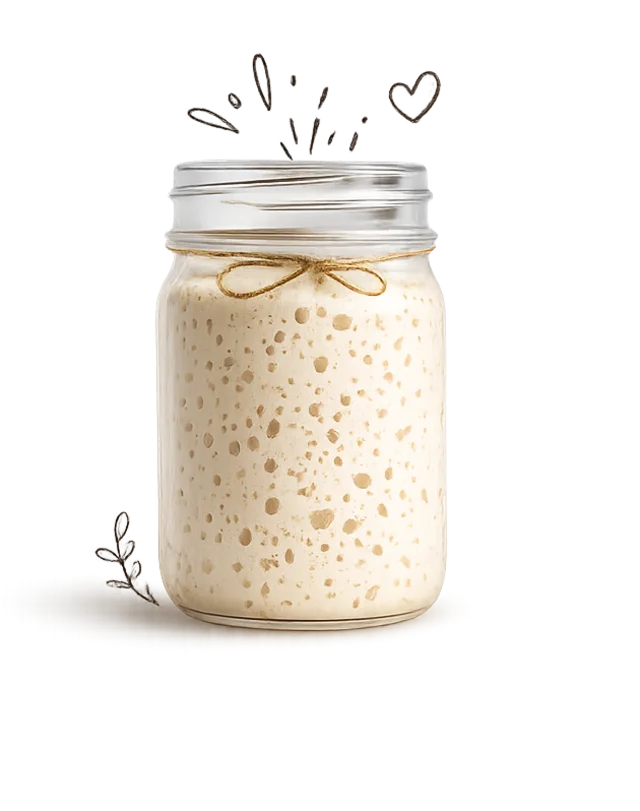 Living sourdough starter in a glass jar